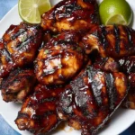 Grilled Coca-Cola Chicken garnished and ready to serve