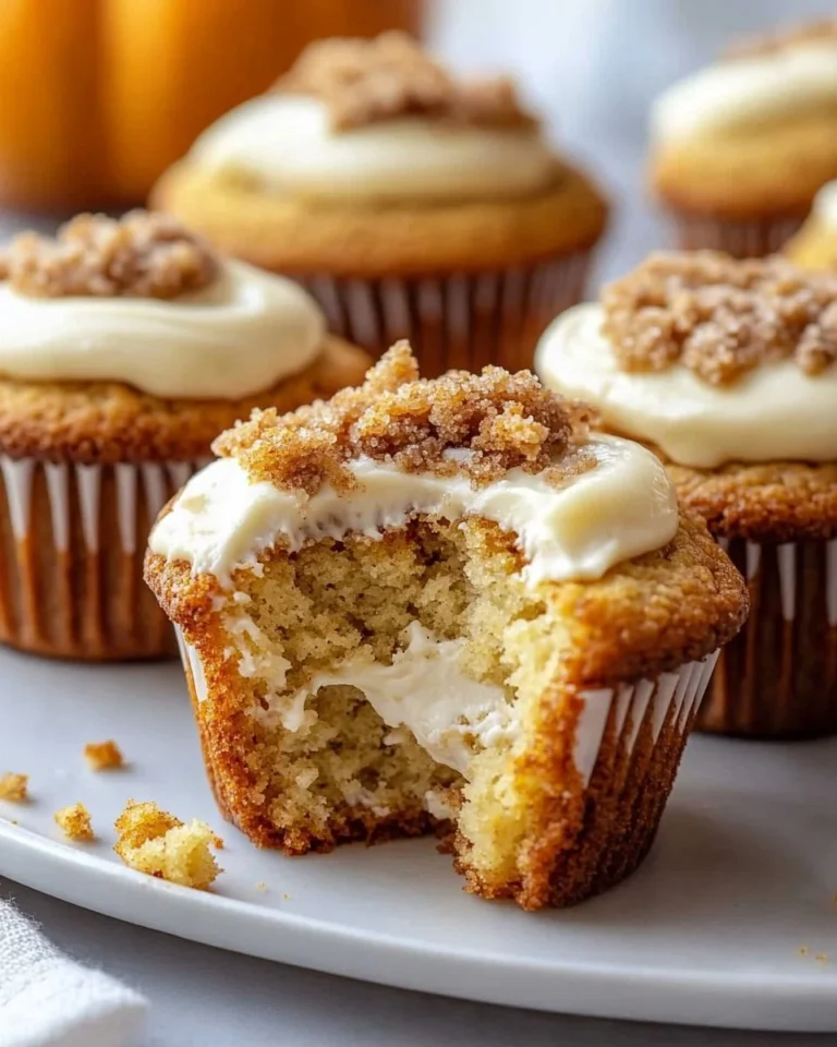 Freshly baked irresistible pumpkin muffins on a cooling rack