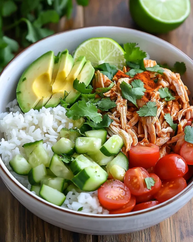 Delicious Mexican pulled chicken served in a tortilla with fresh toppings.