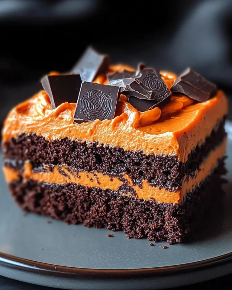 Spooky brownies decorated for Halloween with chocolate frosting and spooky toppings